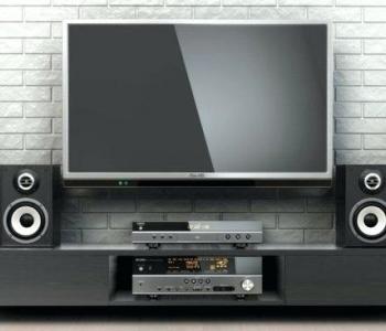 image of a tv with a surround sound system around it