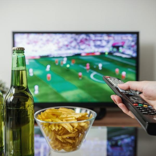 watching tv with snacks